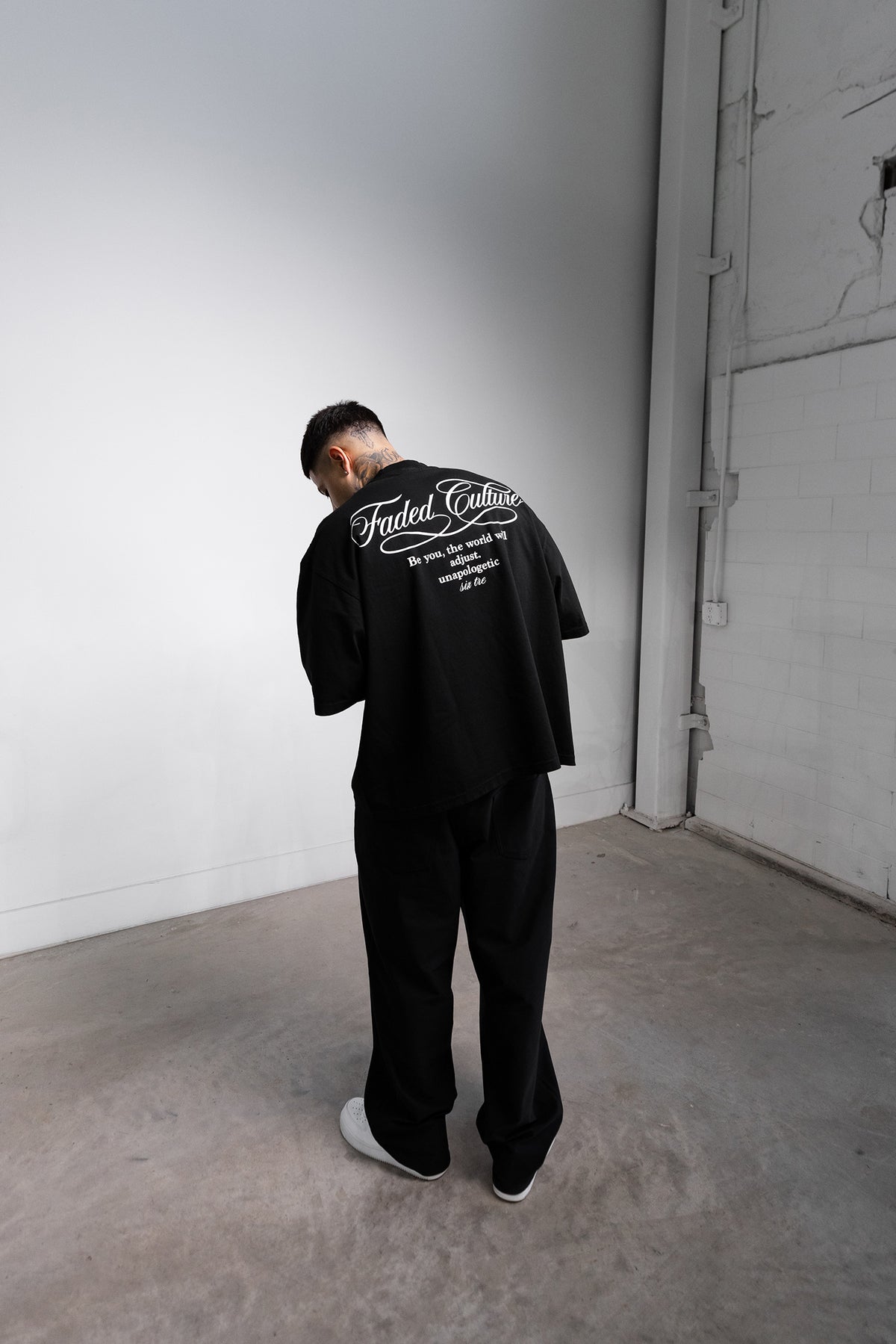 Faded Culture Unapologetic tee, black — back view #color_white