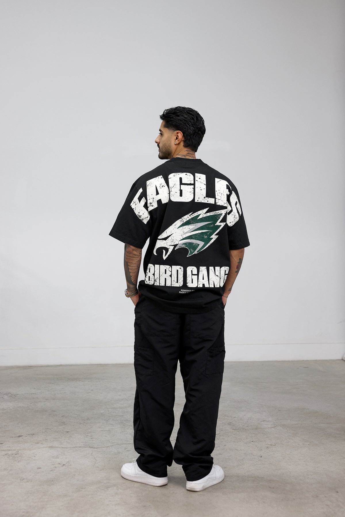 Bird Gang tee in Black, on model #color_black