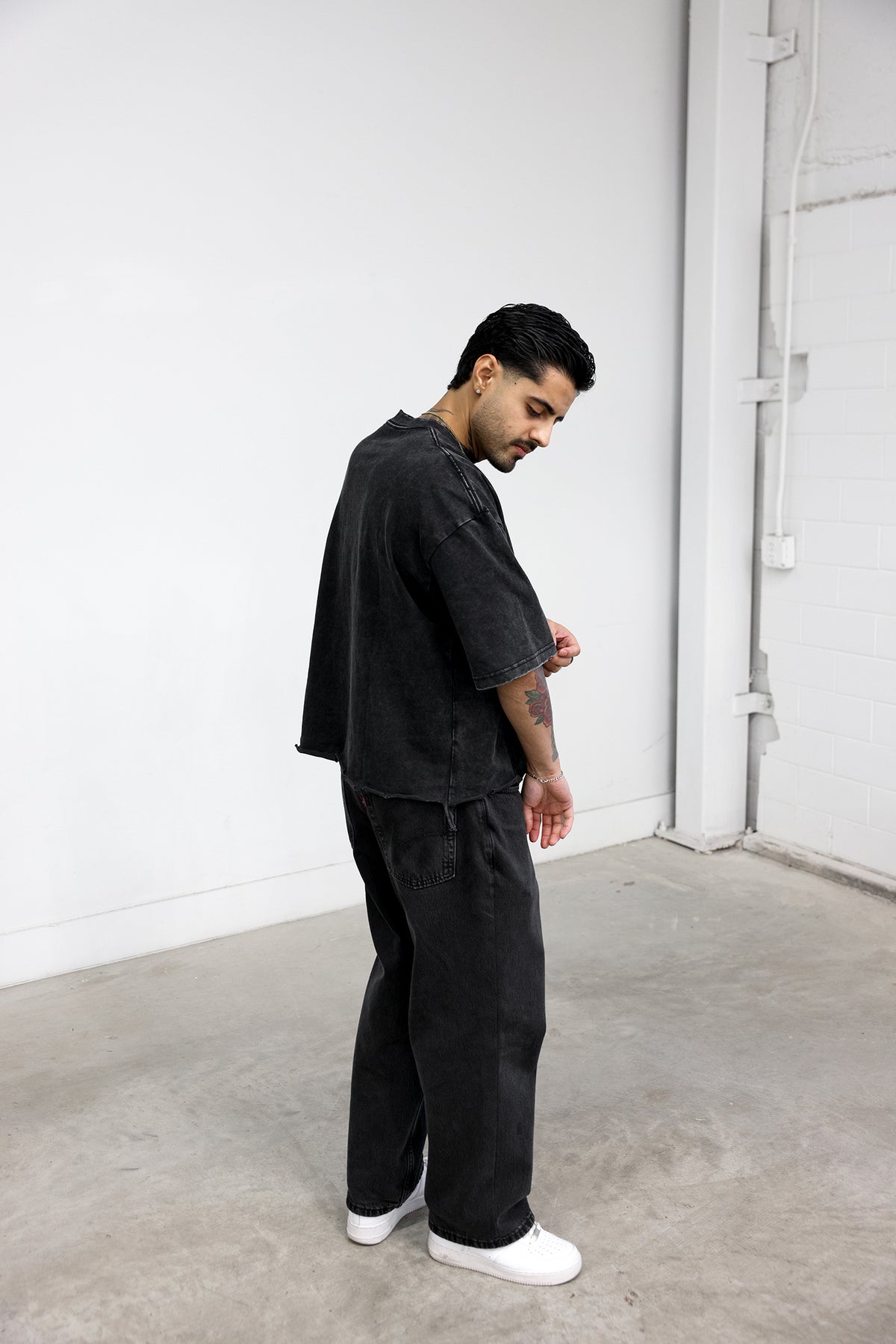 Model wearing the boxy tee, side view
