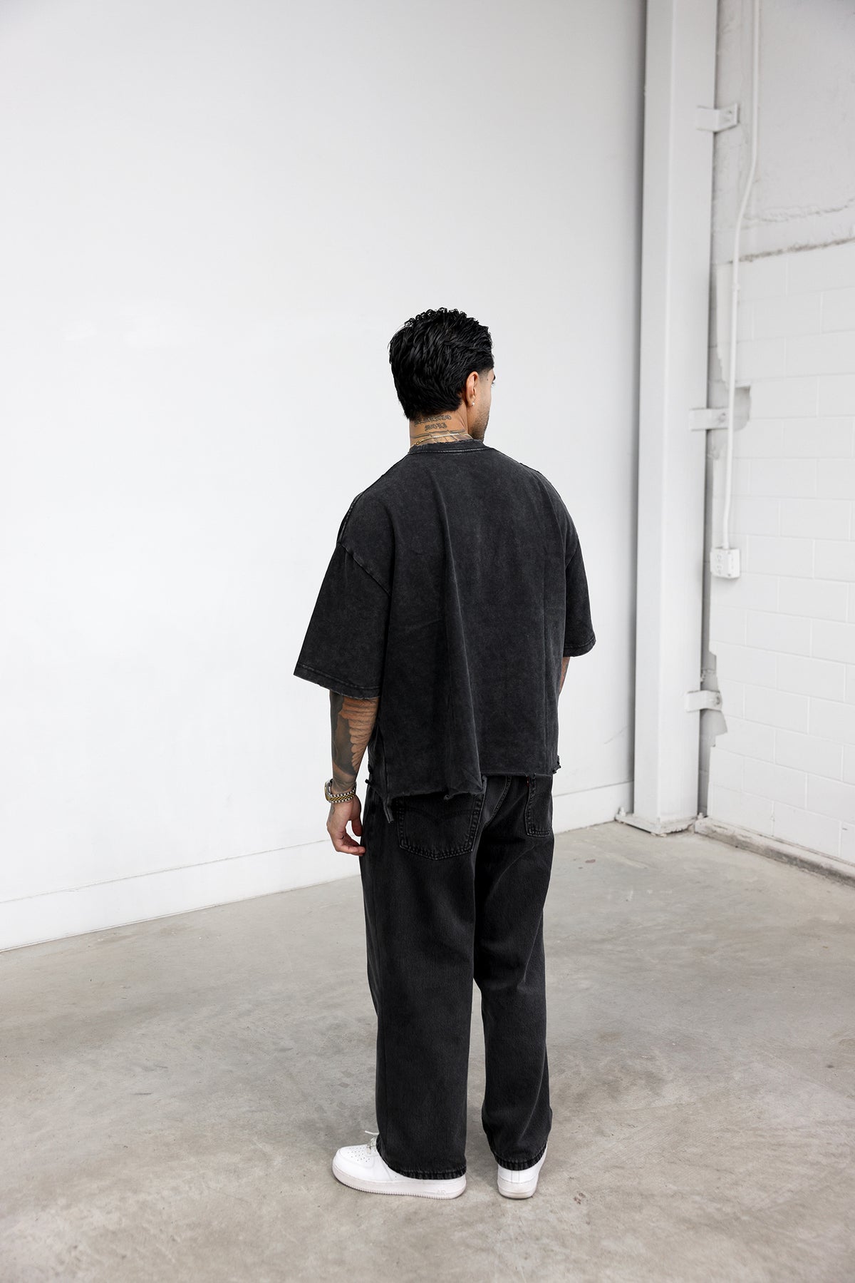 Model wearing the boxy tee, back view