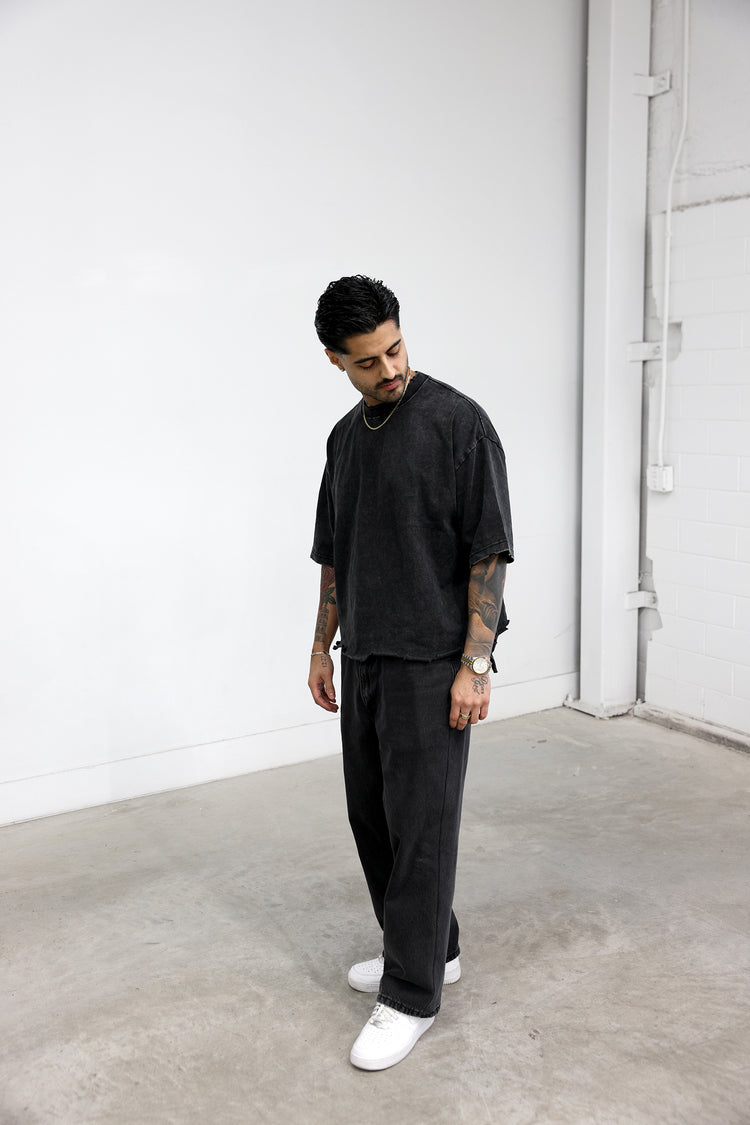 Model wearing the boxy tee, front view, size M