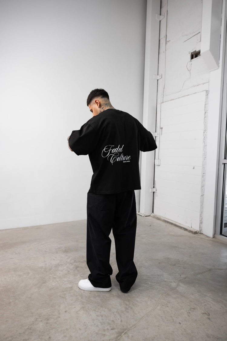 Faded Culture Less Is More tee, black — back view on model #color_black