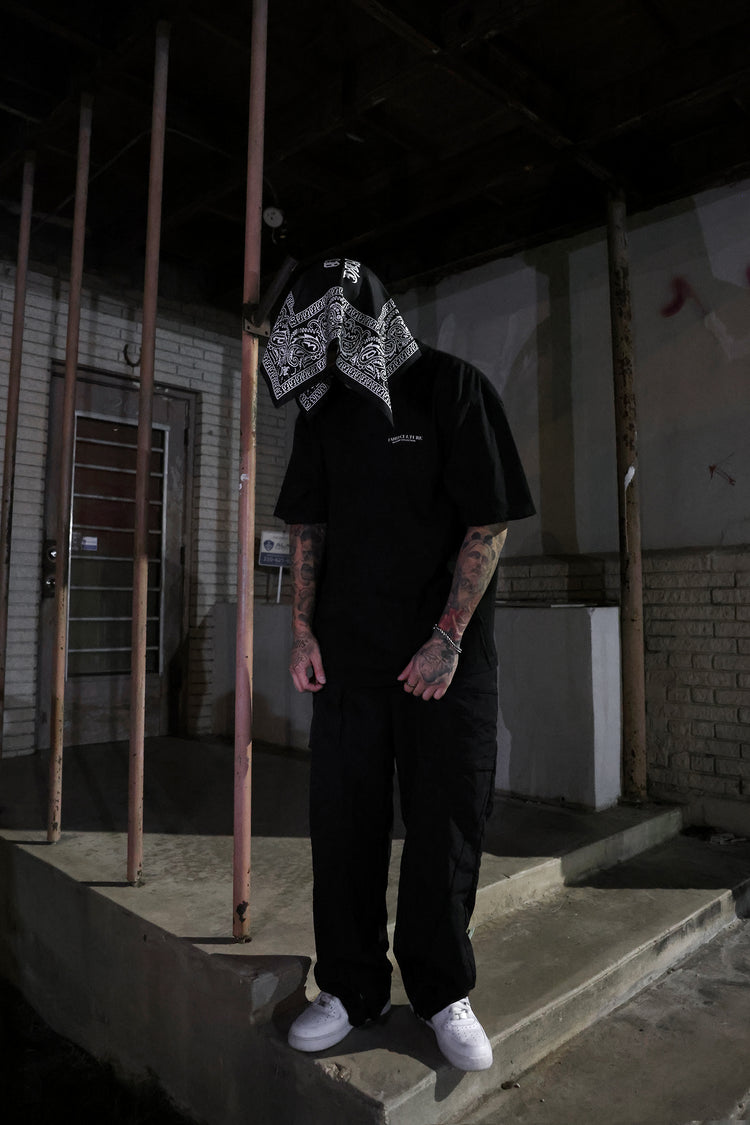Model wearing Masked Up tee, front view, size XL